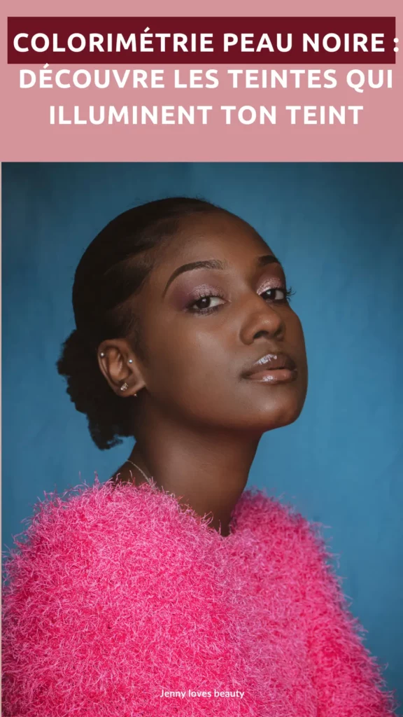 Femme noire foncée au pull rose
